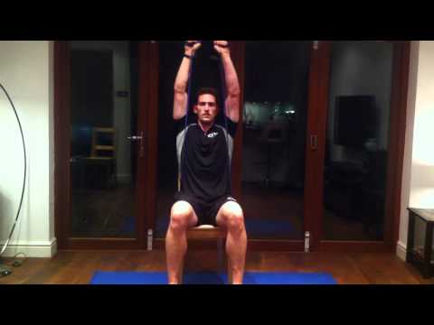Seated shoulder press with resistance band